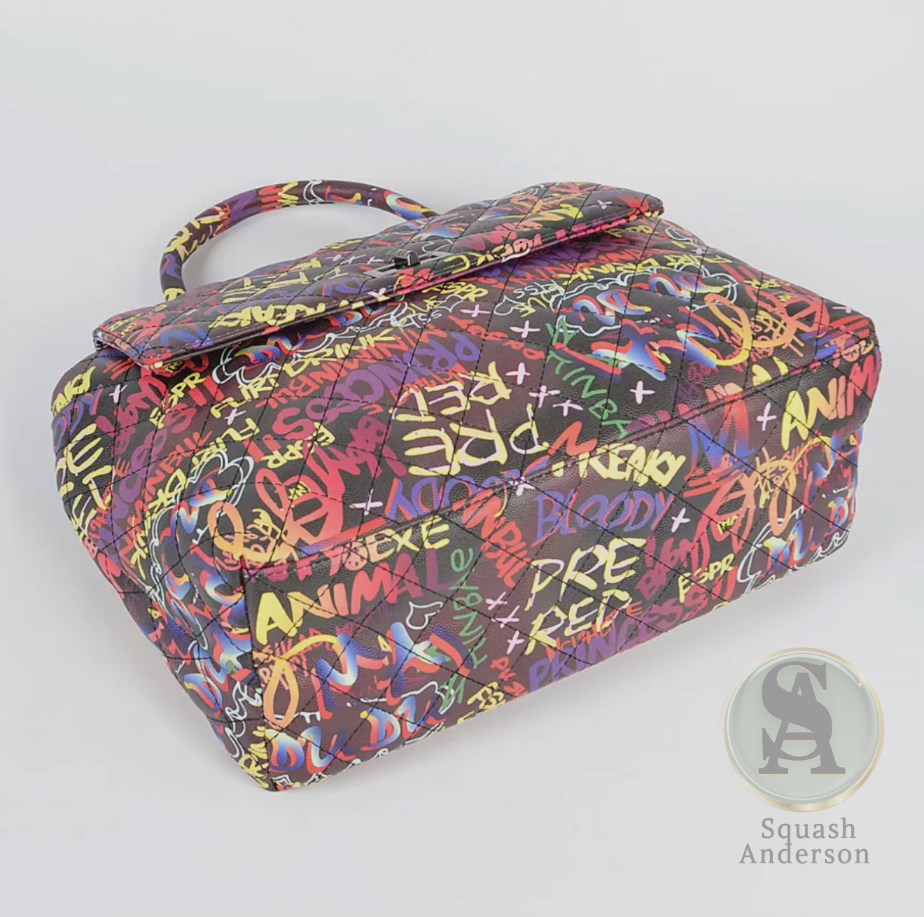 Off the wall Multi Graffiti Clutch